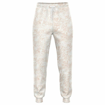 White joggers with pink mud print, pockets, and string for waist.