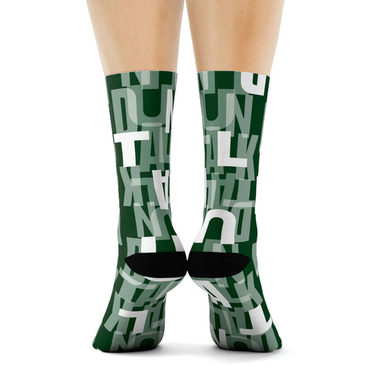 Dark green socks with "Duntalk" print written in white covering the whole sock