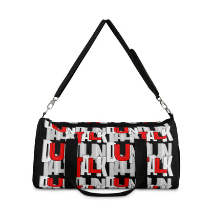 Black duffle bag with two hand straps and an adjustable arm strap. "Duntalk" repeatedly written on the side in white, grey and red lettering. Net pocket on the side. 