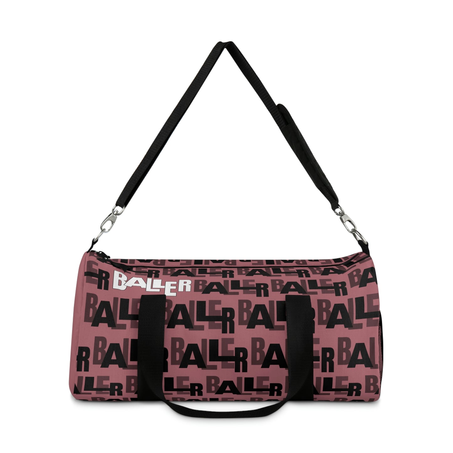 Pink duffle bag with "baller" written in black text around the bag. "Baller" is written once in white on the top left of the bag. Two hand straps and an arm strap