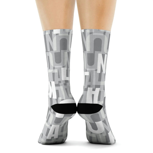 Gray socks with "Duntalk" print written in white and gray covering the whole sock
