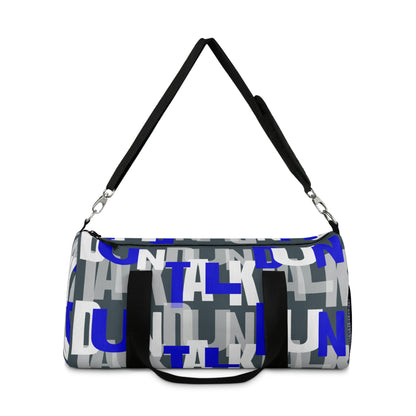 Gray duffle bag with two hand straps and adjustable arm strap with "Duntalk" print written in blue, white, and gray. Net pocket on the side